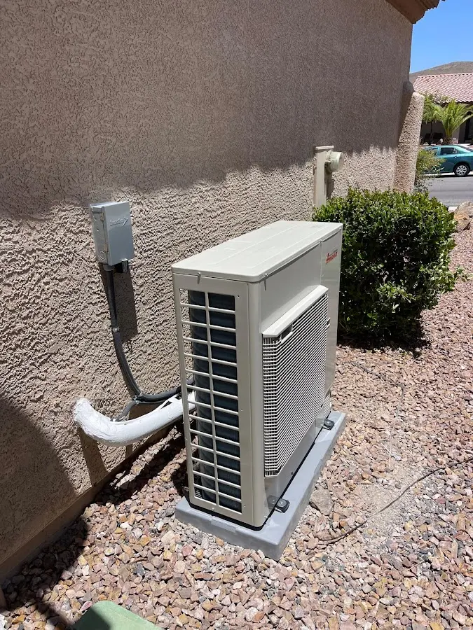 Residential air conditioning condenser unit in Salida